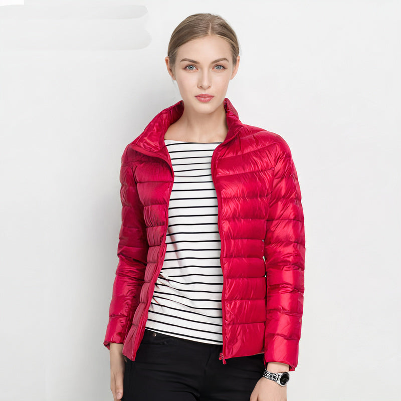 Donsjas voor dames — licht en warm met capuchon en ritssluiting