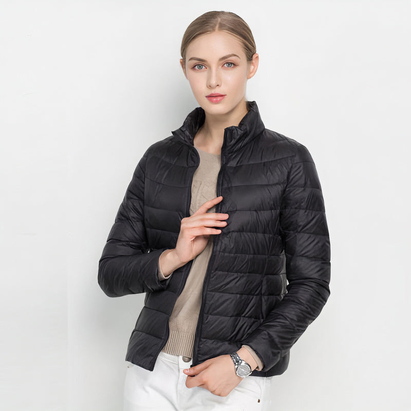 Donsjas voor dames — licht en warm met capuchon en ritssluiting