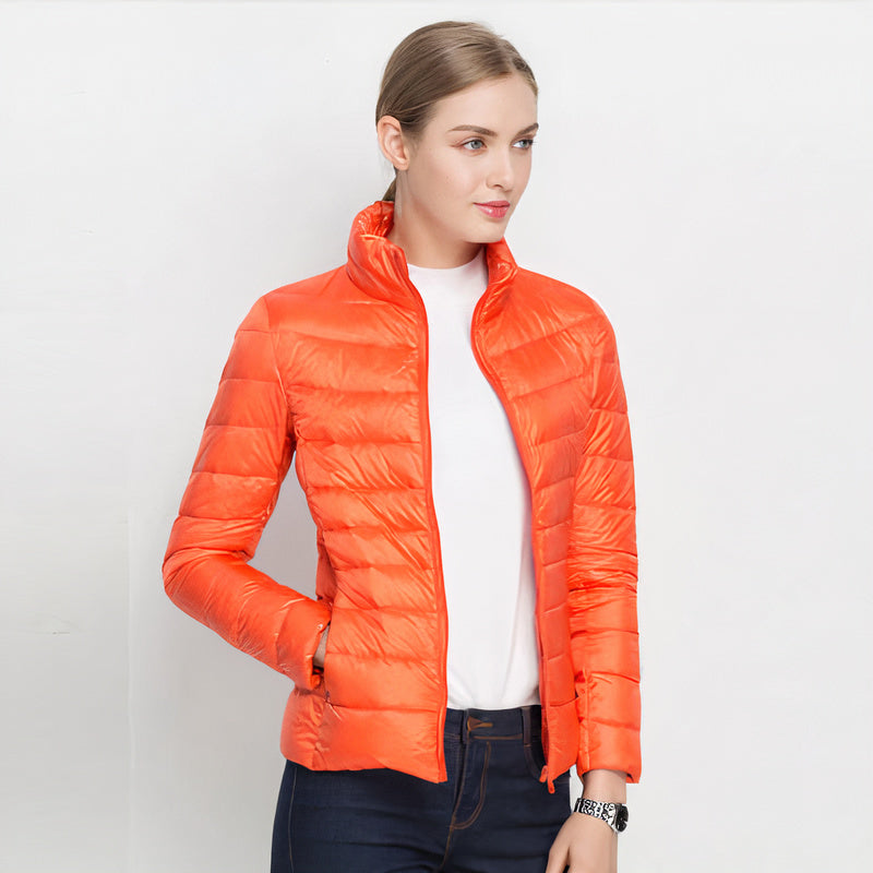 Donsjas voor dames — licht en warm met capuchon en ritssluiting