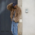 Dames jas van imitatiebont — elegante en warme winterjas van zachte pluche