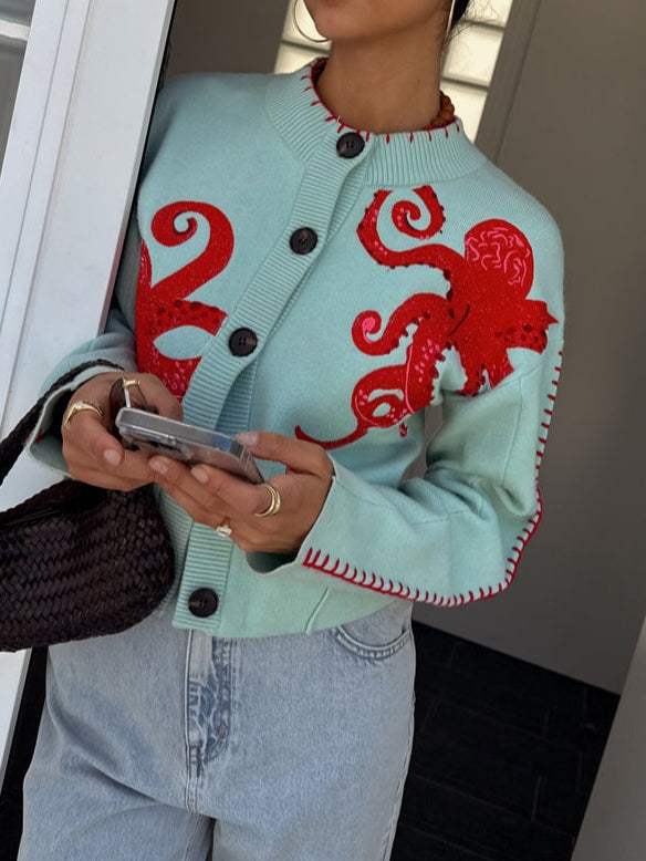 Dames gebreid vest — met knopen, octopusmotief en ronde hals