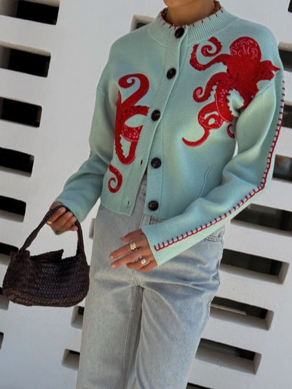 Dames gebreid vest — met knopen, octopusmotief en ronde hals