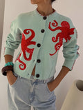 Dames gebreid vest — met knopen, octopusmotief en ronde hals