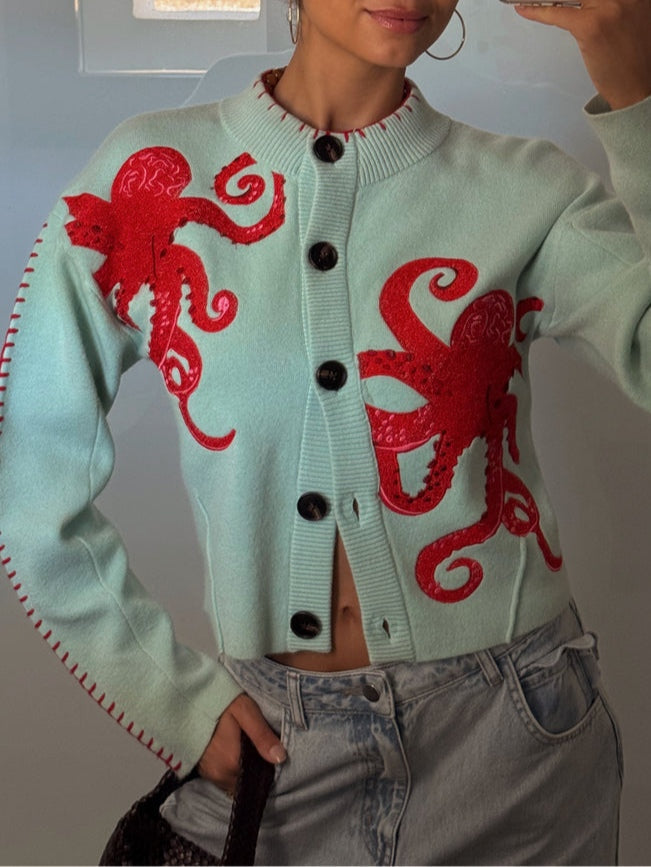 Dames gebreid vest — met knopen, octopusmotief en ronde hals
