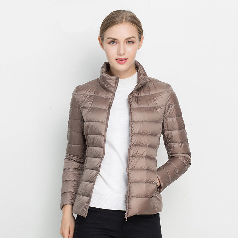 Donsjas voor dames — licht en warm met capuchon en ritssluiting